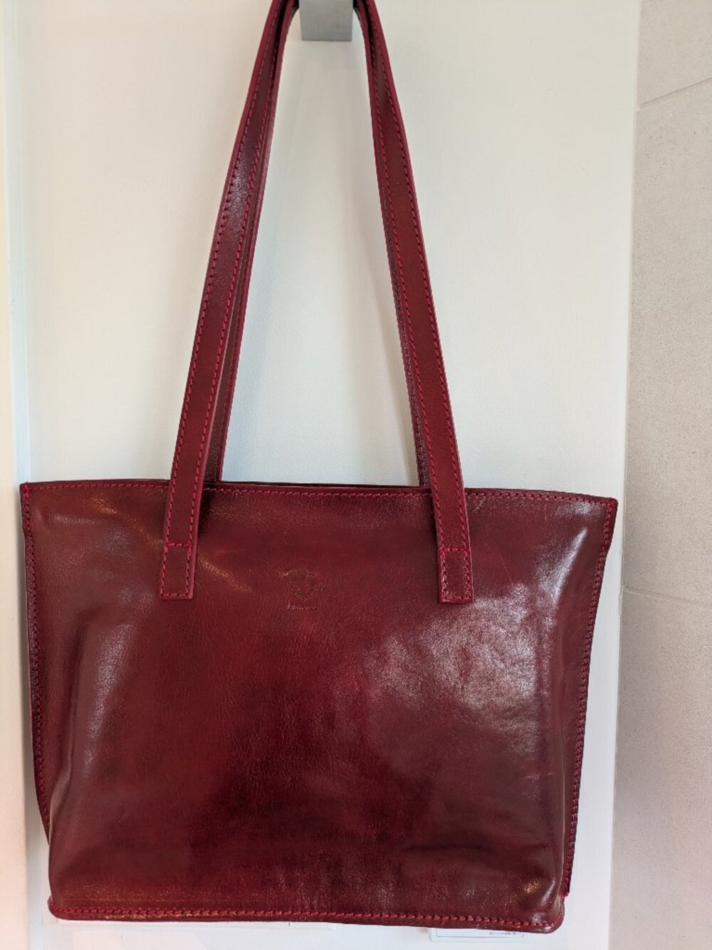 Authentic handmade red leather handbag Florence, Italy "Vera Pelle" emblem.